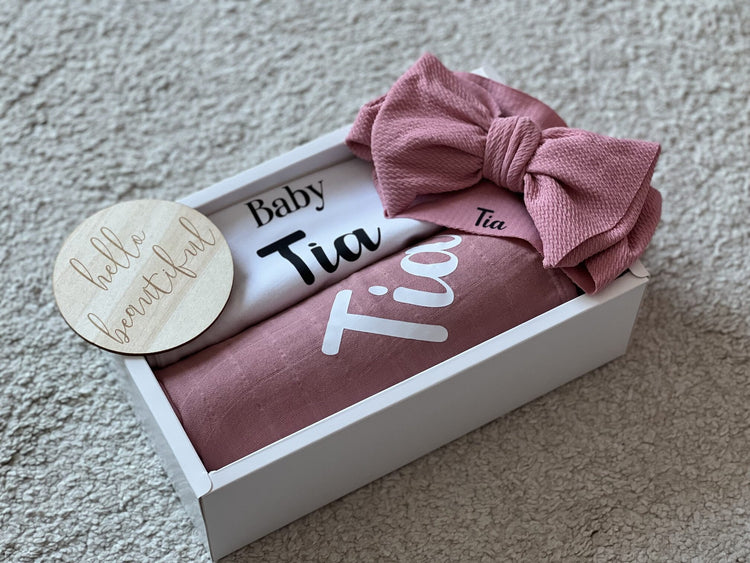 baby gift box with personalised onesie, swaddle blanket and headband/bow